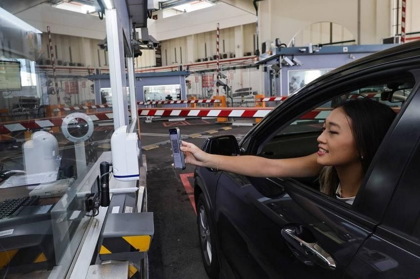 新加坡出入境實(shí)現(xiàn)高效通行.jpg 新加坡出入境實(shí)現(xiàn)高效通行.jpg